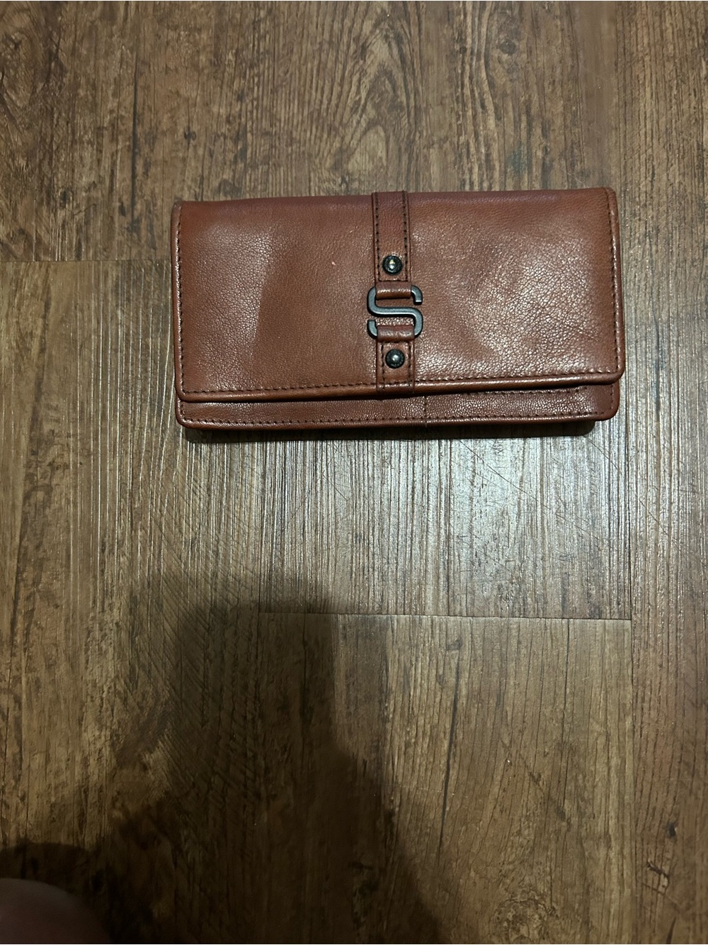 Brown Leather Continental Wallet with S-Shaped Metal Accent